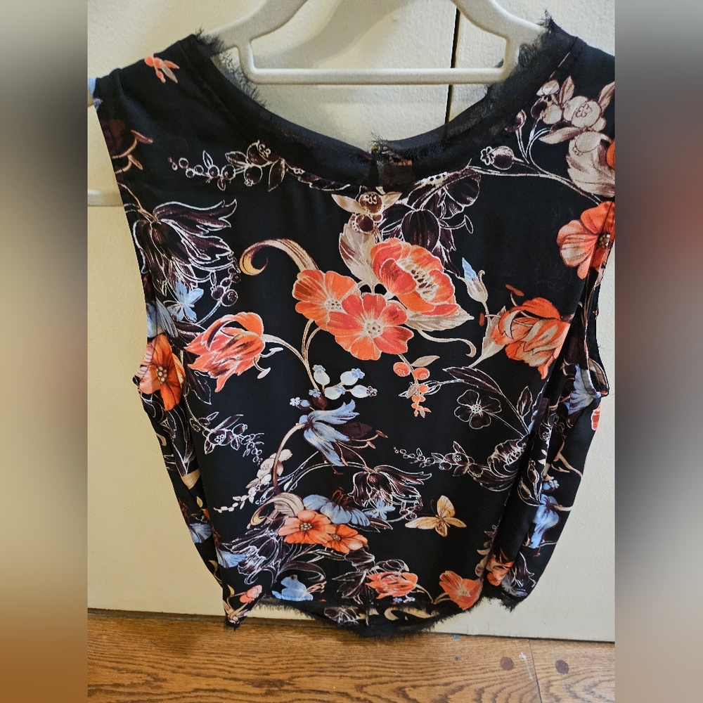 Cute black butterfly blouse with fringe bottom